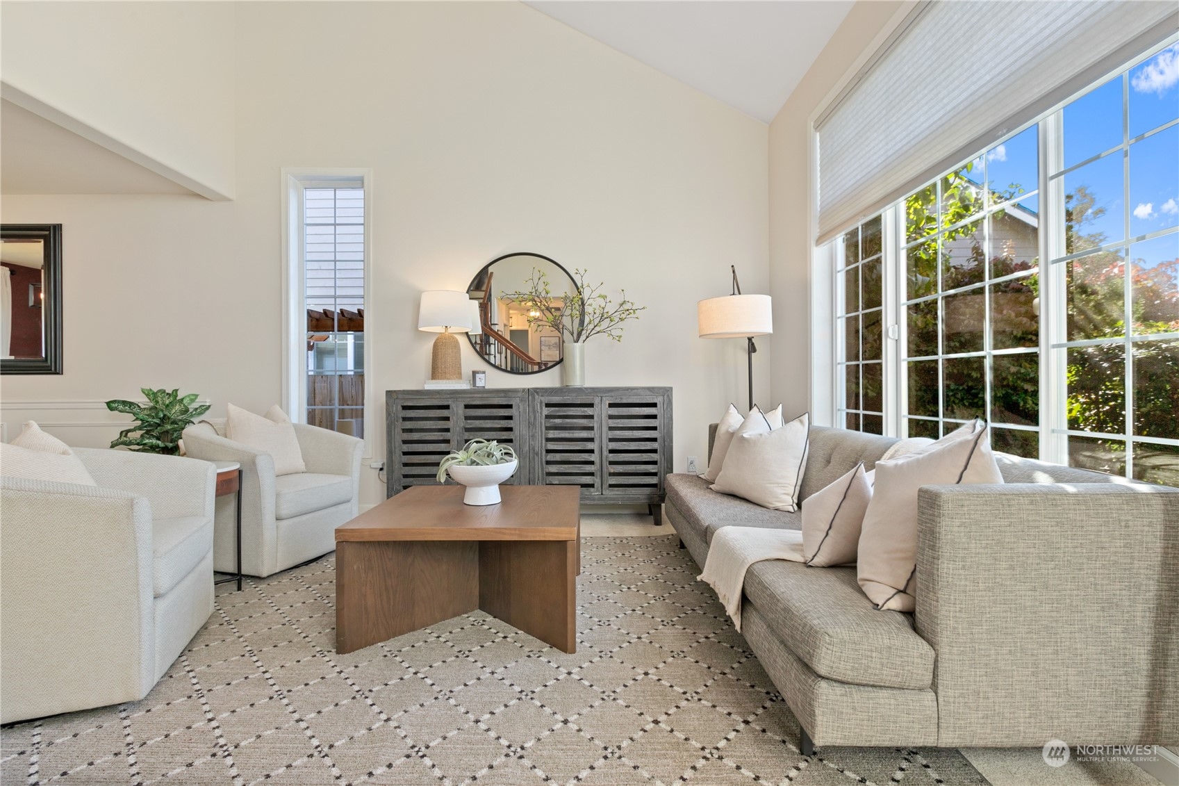 18205 27th Drive Southeast Bothell, WA 98012 - Photo 7 of 37 a living room with furniture a window and a potted plant