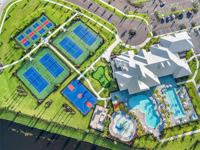 a view of a swimming pool with a patio