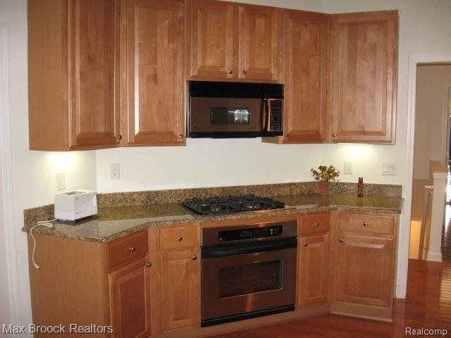3700 Tremonte Circle, Unit 85 Rochester, MI 48306 - Photo 6 of 18 TREMONTE KIT.jpg