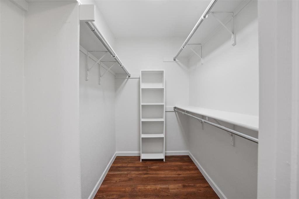 6500 Spur Ranch Court Plano, TX 75023 - Photo 14 of 32 a view of an empty walk in closet