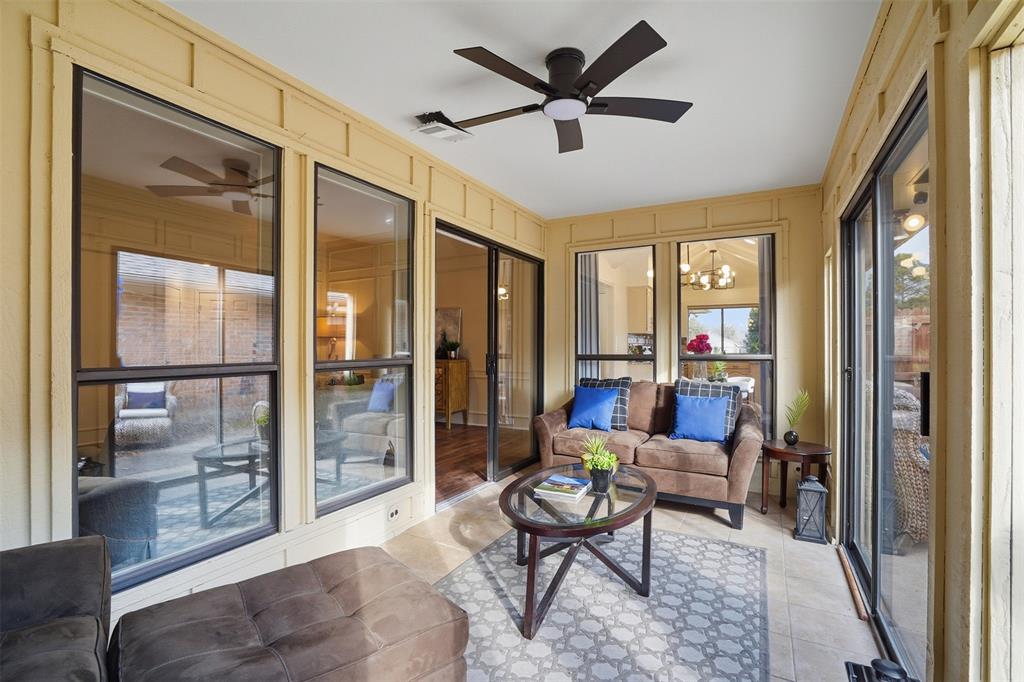 6500 Spur Ranch Court Plano, TX 75023 - Photo 19 of 32 a living room with furniture and a large window