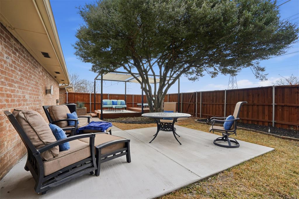 6500 Spur Ranch Court Plano, TX 75023 - Photo 23 of 32 a building outdoor space with patio furniture