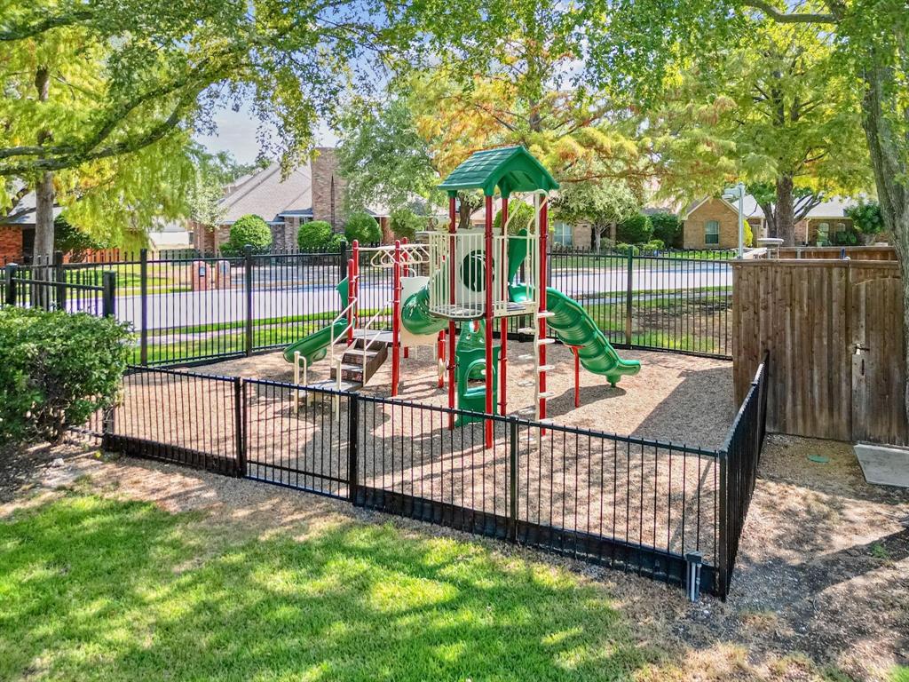 6500 Spur Ranch Court Plano, TX 75023 - Photo 27 of 32 a view of outdoor space with seating and trees