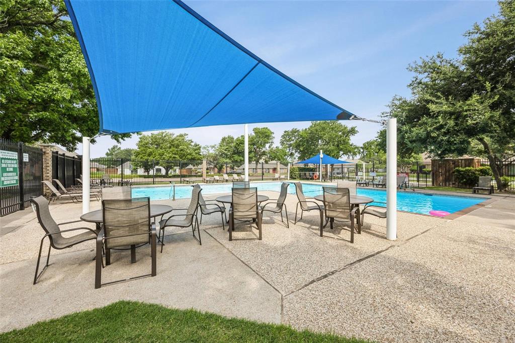 6500 Spur Ranch Court Plano, TX 75023 - Photo 31 of 32 a view of a two chairs and table in the yard