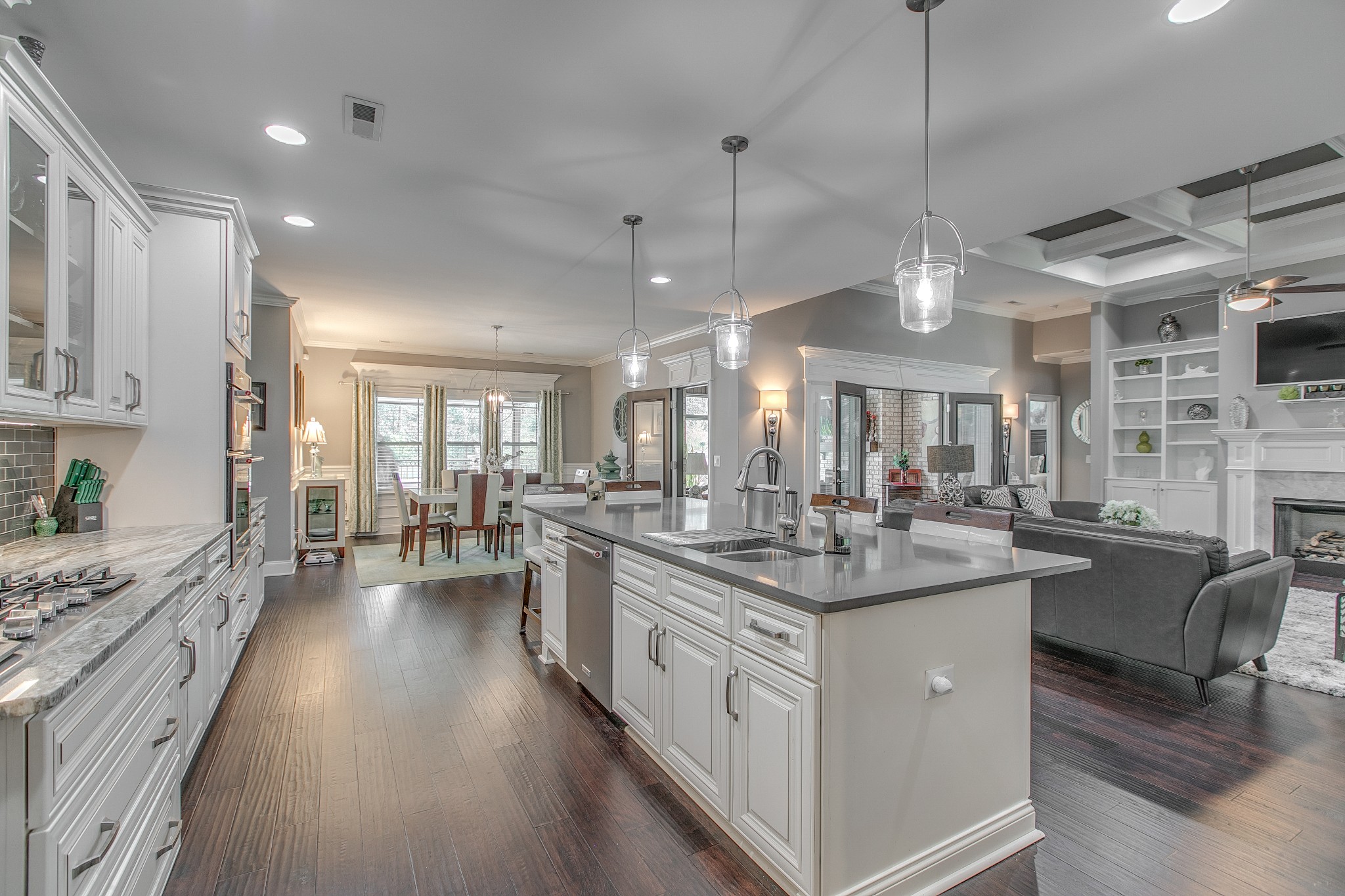 7745 Santos Drive Murfreesboro, TN 37129 - Photo 19 of 58 a kitchen with counter top space a sink appliances and cabinets
