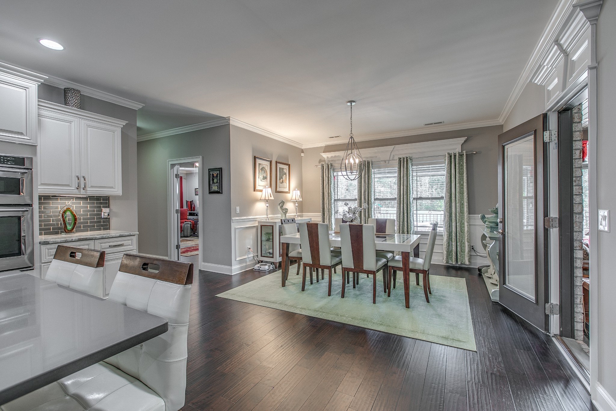 7745 Santos Drive Murfreesboro, TN 37129 - Photo 21 of 58 a view of a dining room with furniture window and wooden floor