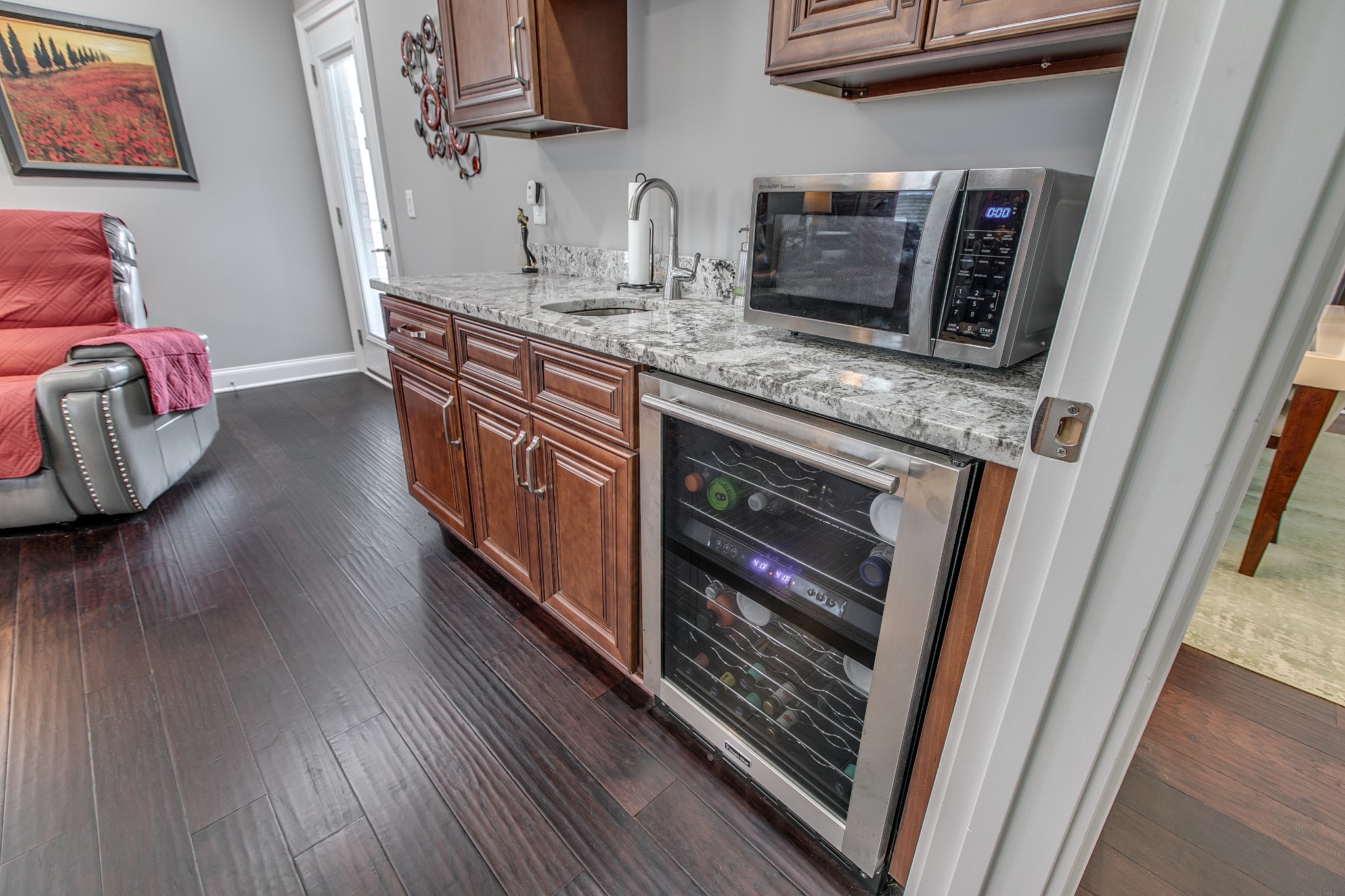 7745 Santos Drive Murfreesboro, TN 37129 - Photo 24 of 58 a kitchen with stainless steel appliances granite countertop a stove a sink and a microwave