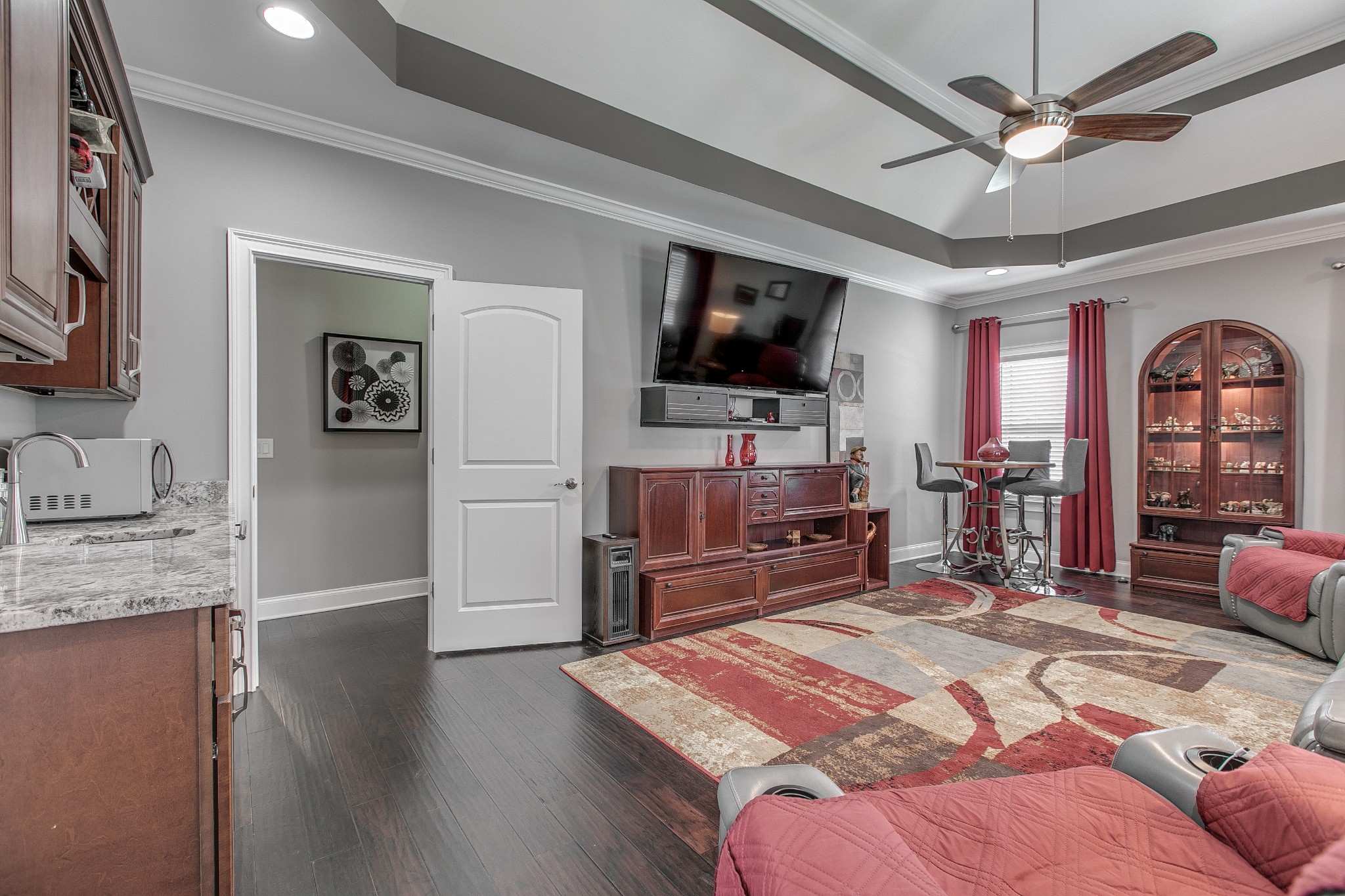 7745 Santos Drive Murfreesboro, TN 37129 - Photo 25 of 58 a bedroom with furniture and a flat screen tv