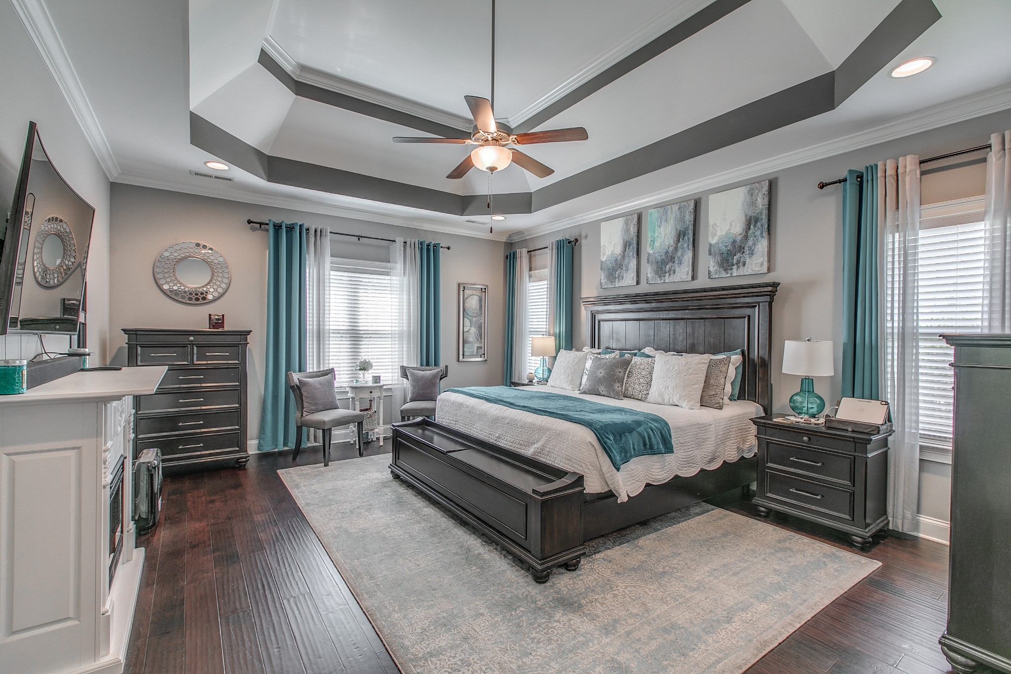 7745 Santos Drive Murfreesboro, TN 37129 - Photo 26 of 58 a spacious bedroom with a bed a chandelier and windows