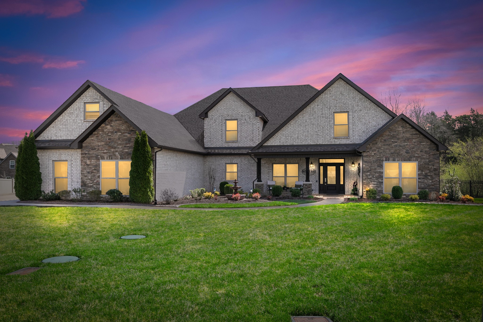 7745 Santos Drive Murfreesboro, TN 37129 - Photo 3 of 58 a view of a house with a big yard and large trees