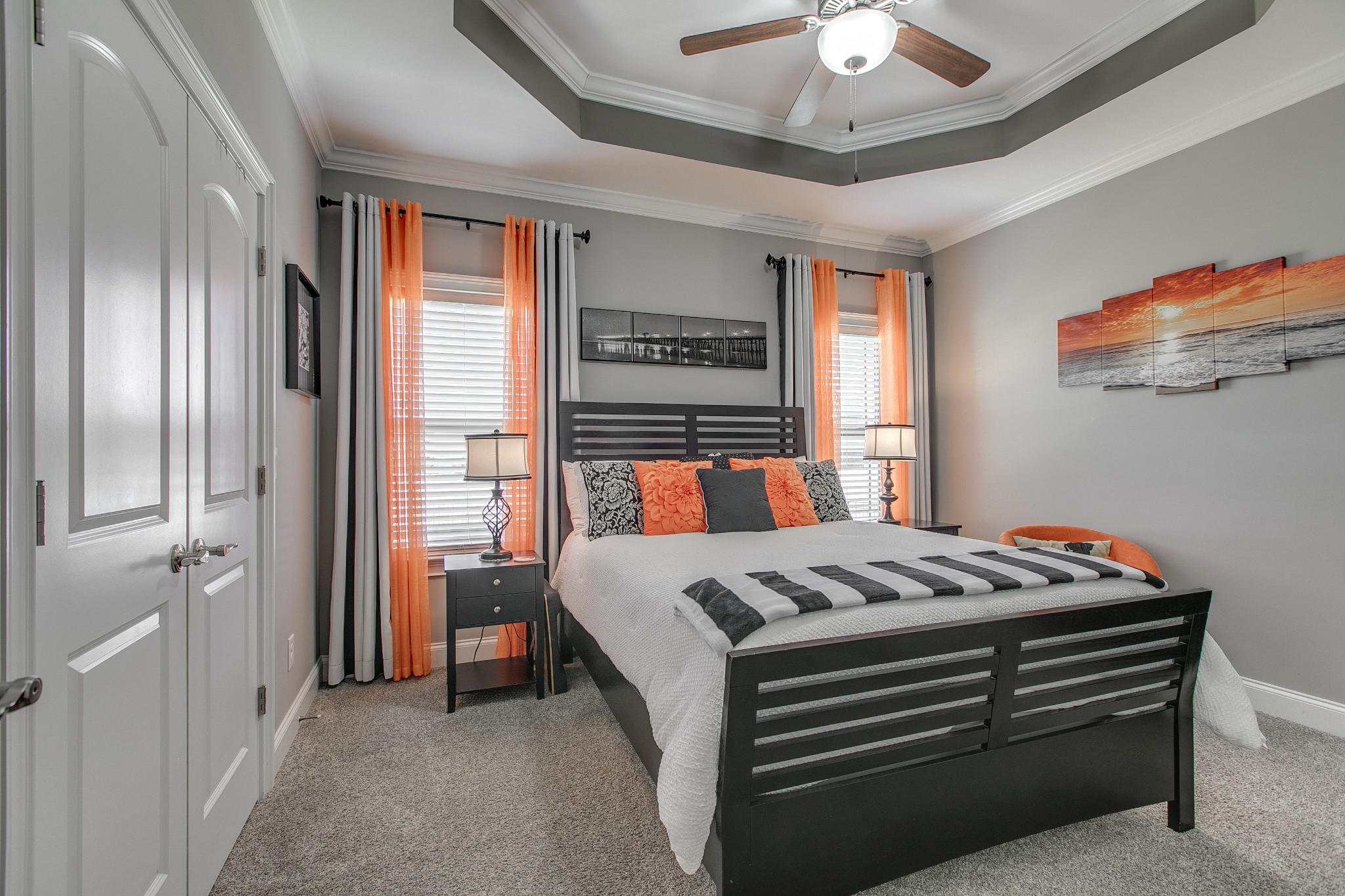 7745 Santos Drive Murfreesboro, TN 37129 - Photo 31 of 58 a bedroom with a bed and a chandelier