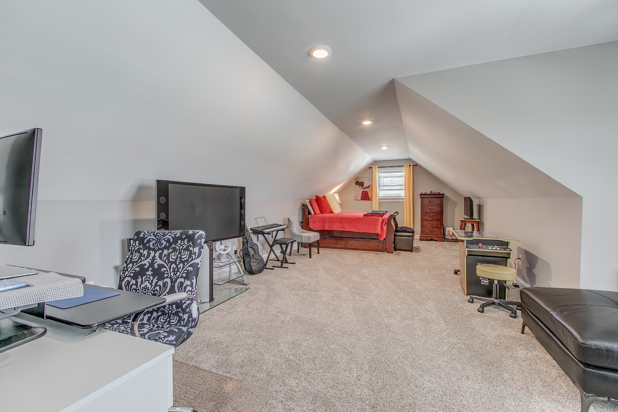 7745 Santos Drive Murfreesboro, TN 37129 - Photo 39 of 58 a bedroom with furniture and a flat screen tv
