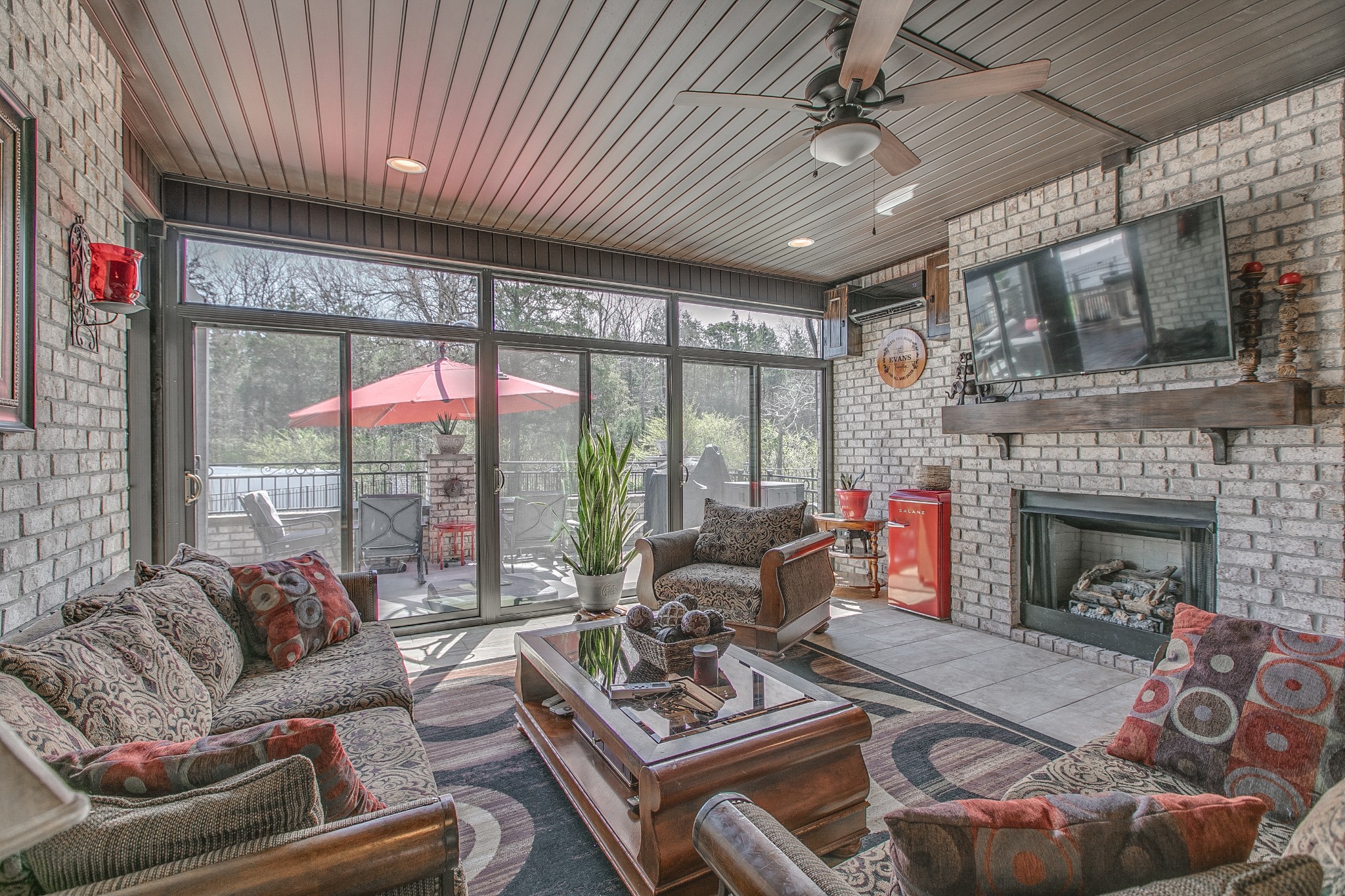 7745 Santos Drive Murfreesboro, TN 37129 - Photo 42 of 58 a living room with furniture and a fireplace