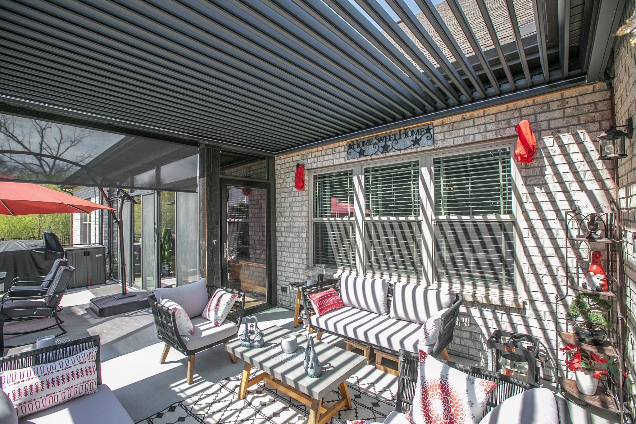 7745 Santos Drive Murfreesboro, TN 37129 - Photo 46 of 58 a view of a patio with table and chairs and potted plants