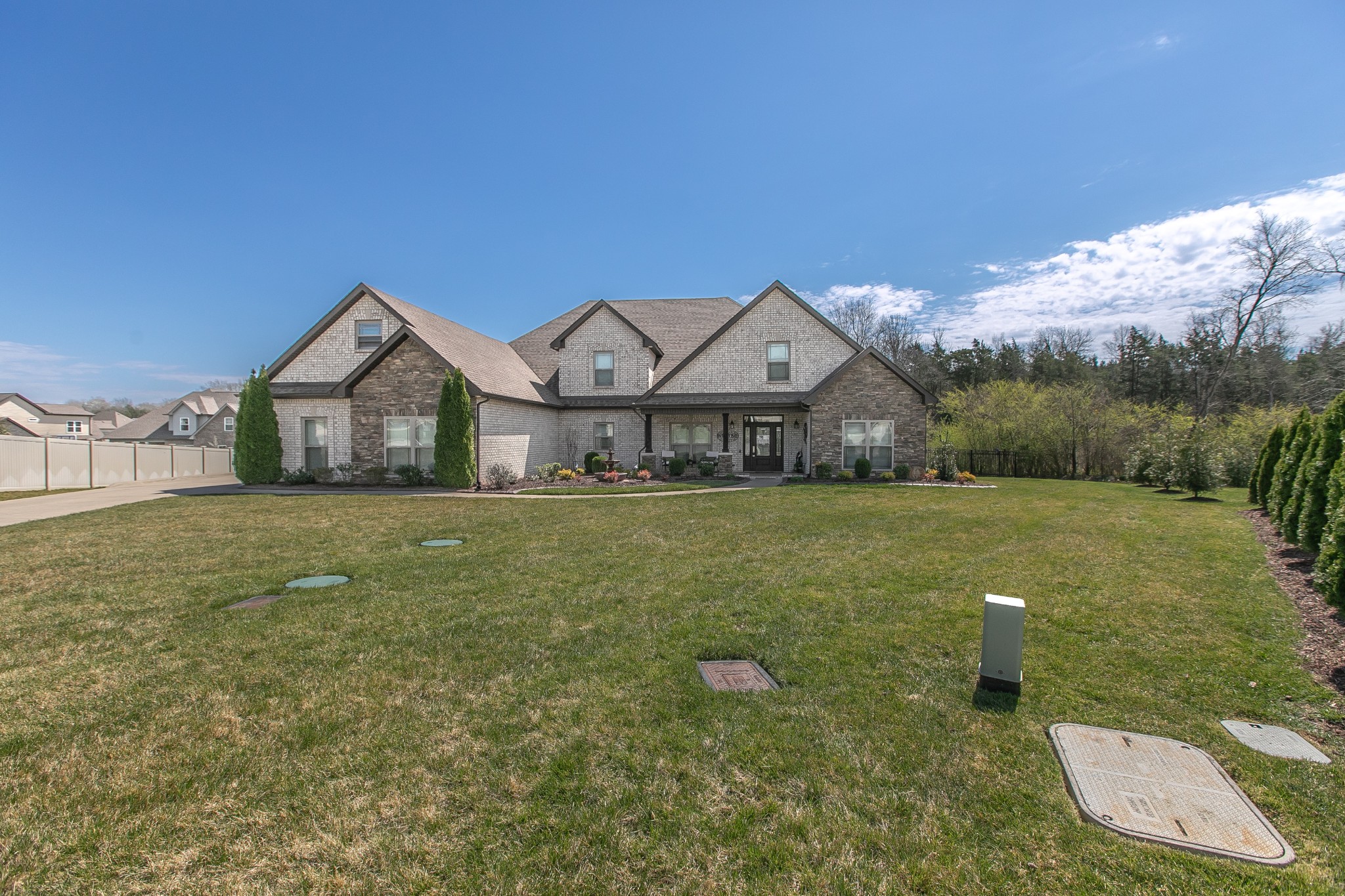 7745 Santos Drive Murfreesboro, TN 37129 - Photo 55 of 58 a front view of a house with garden