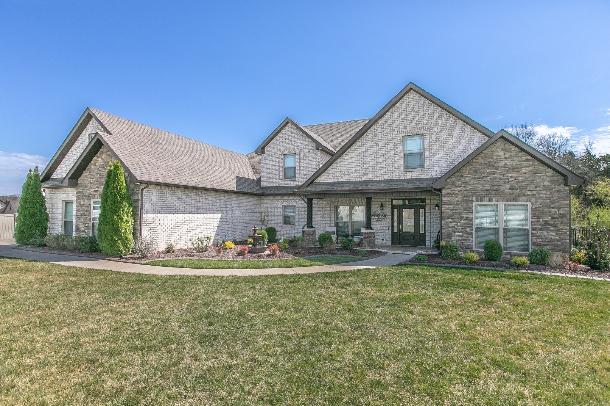 7745 Santos Drive Murfreesboro, TN 37129 - Photo 56 of 58 a front view of house with yard and green space