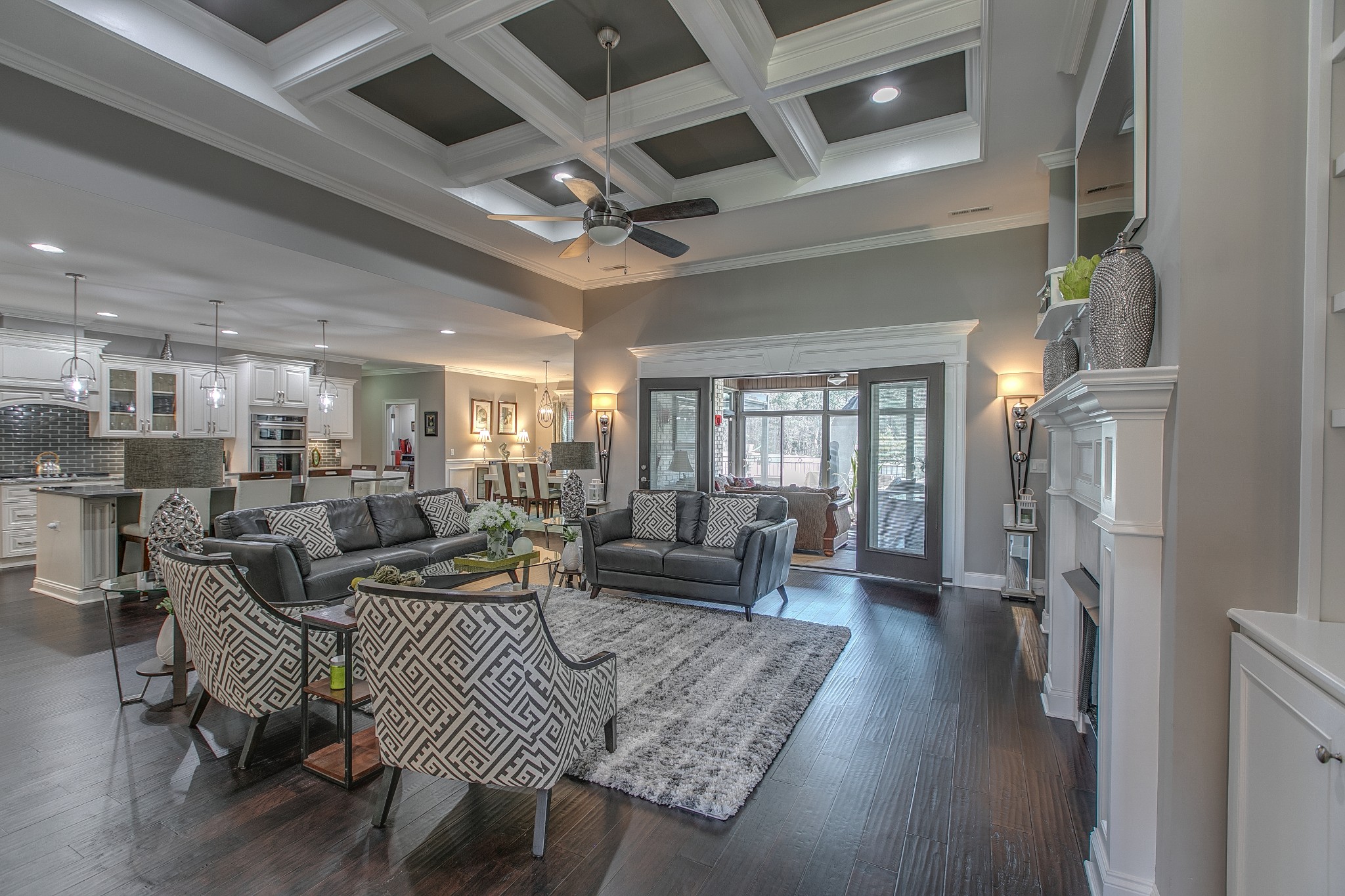 7745 Santos Drive Murfreesboro, TN 37129 - Photo 8 of 58 a living room with lots of furniture and a chandelier