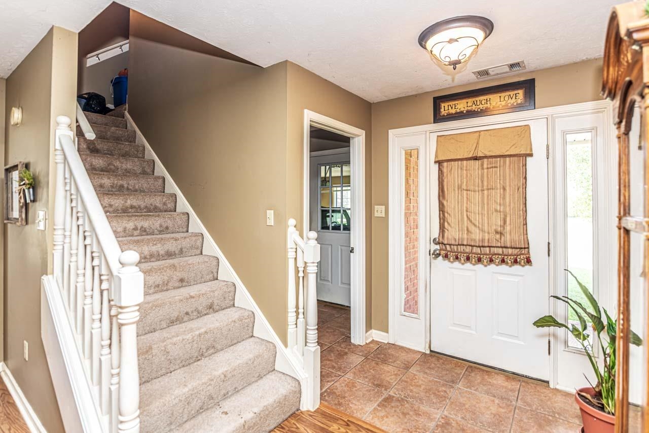 706 Liberty Church Smith Road Brighton, TN 38011 - Photo 28 of 35 an entryway with a flower pot and a window