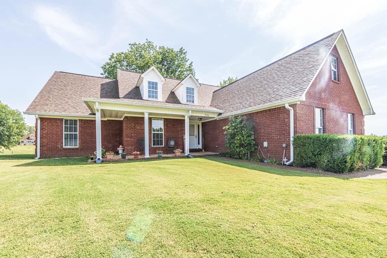 706 Liberty Church Smith Road Brighton, TN 38011 - Photo 3 of 35 a view of a house with swimming pool and a yard
