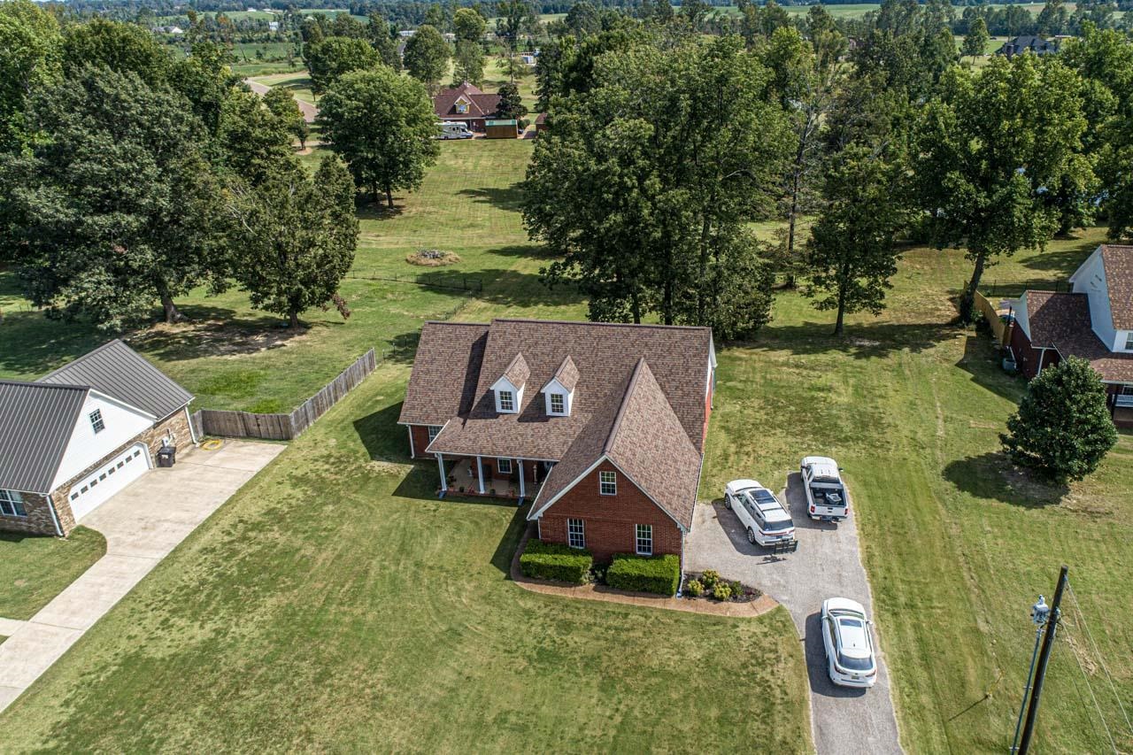706 Liberty Church Smith Road Brighton, TN 38011 - Photo 6 of 35 an aerial view of a house with swimming pool garden and outdoor seating