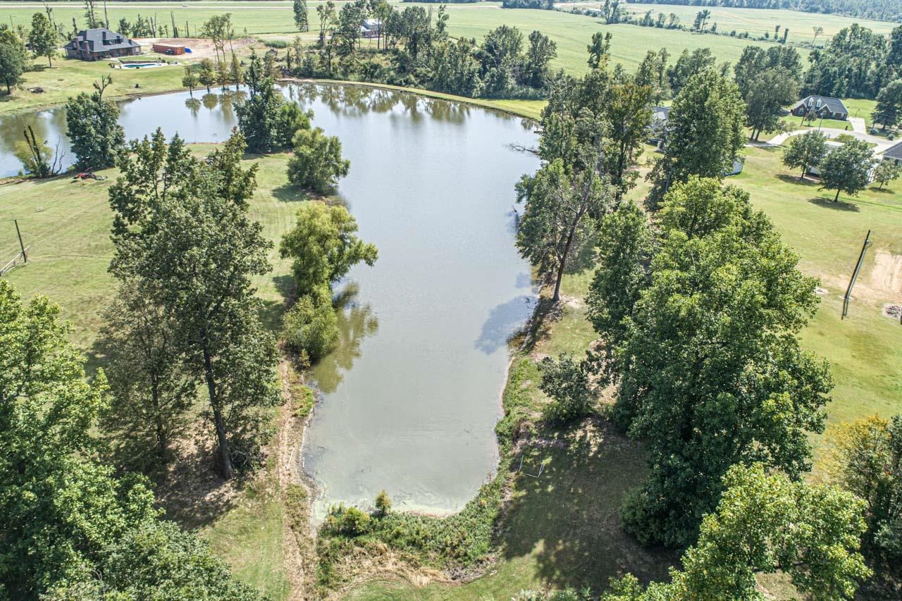706 Liberty Church Smith Road Brighton, TN 38011 - Photo 7 of 35 a view of a lake with a yard and mountain view