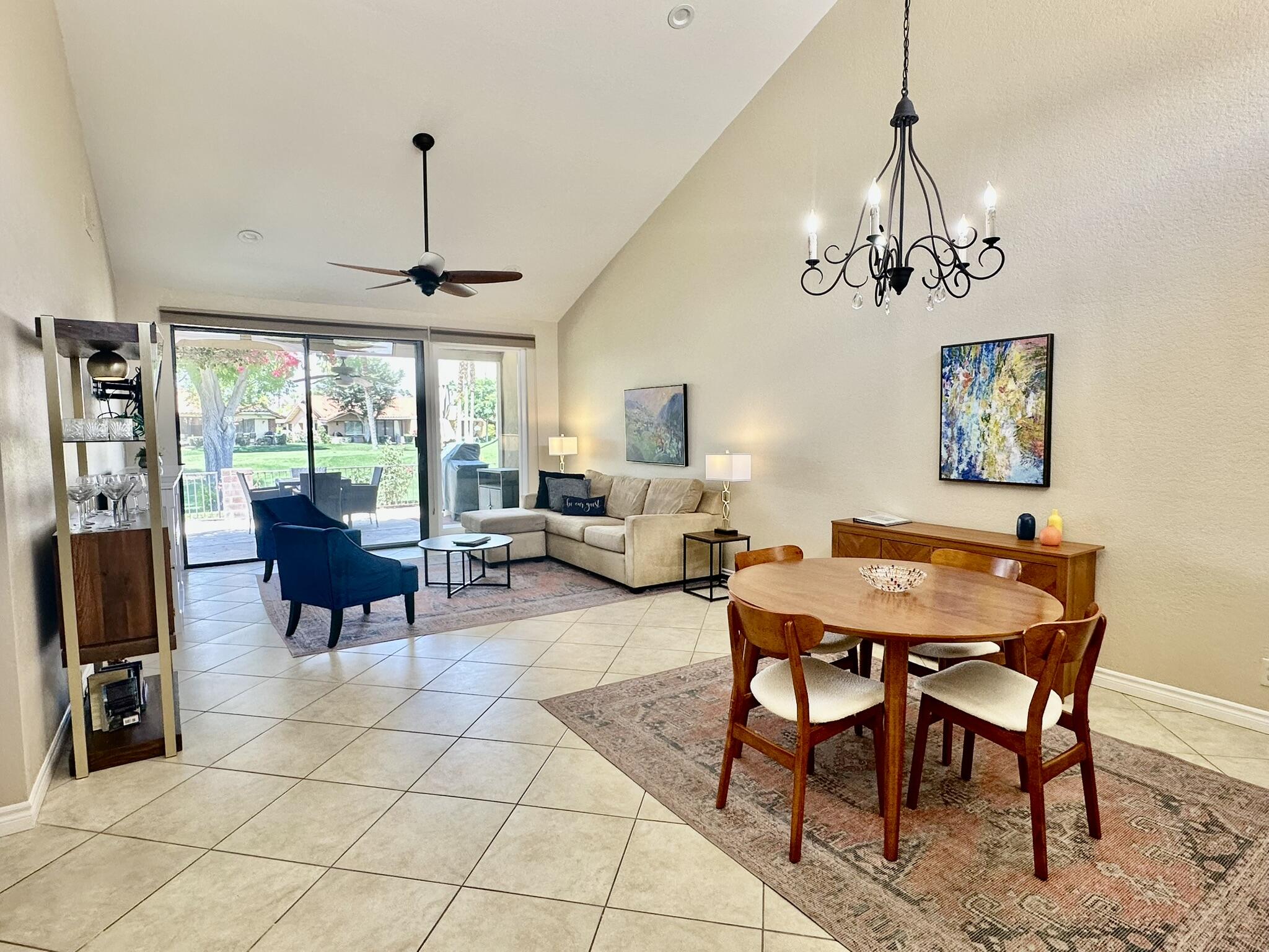 336 Villena Way Palm Desert, CA 92260 - Photo 6 of 19 a view of a livingroom and dining room