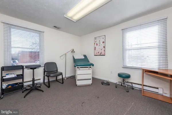a room with furniture and a window