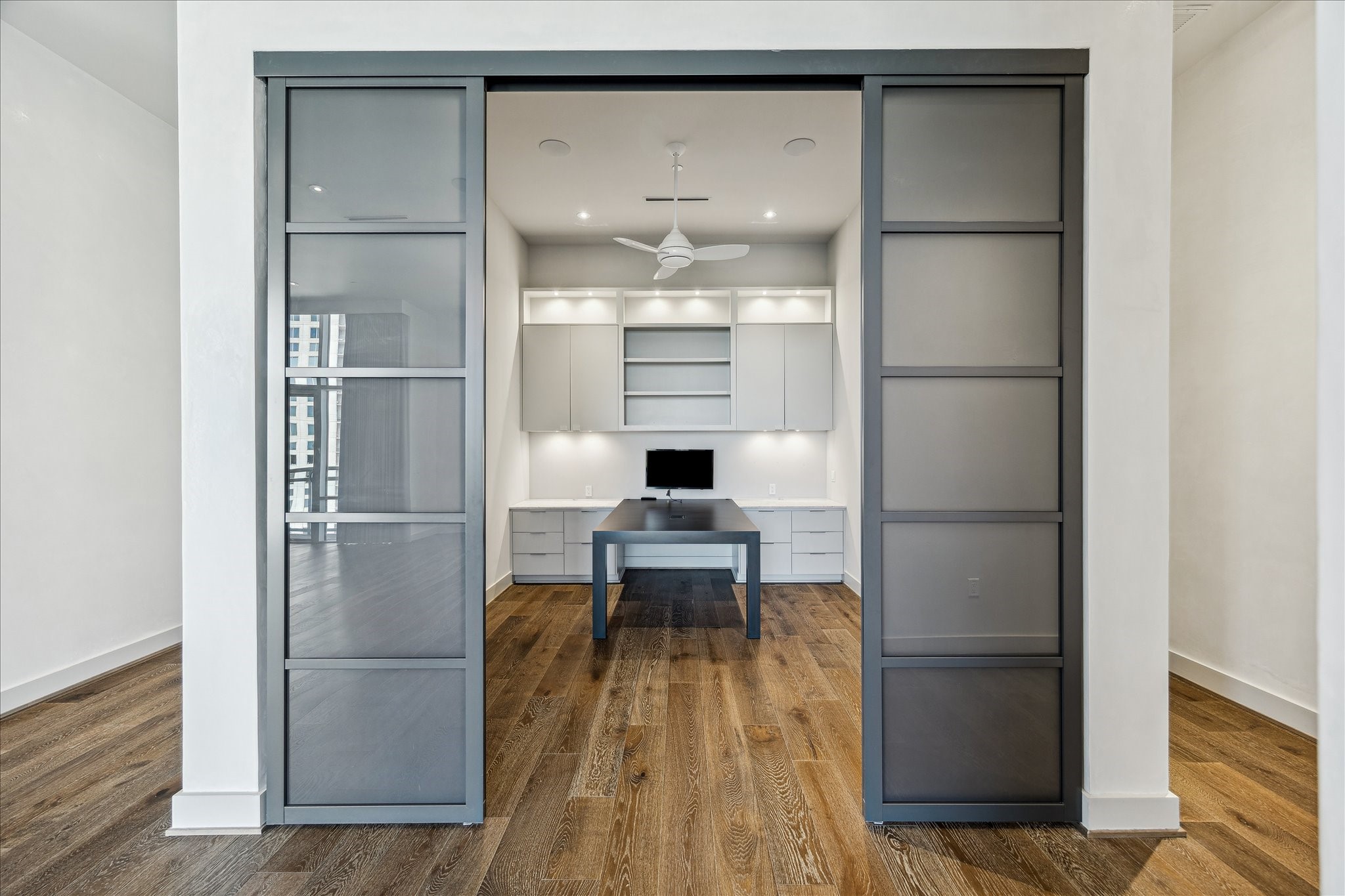 3331 D'Amico Street, Unit 1003 Houston, TX 77019 - Photo 15 of 46 a dining room with furniture and wooden floor