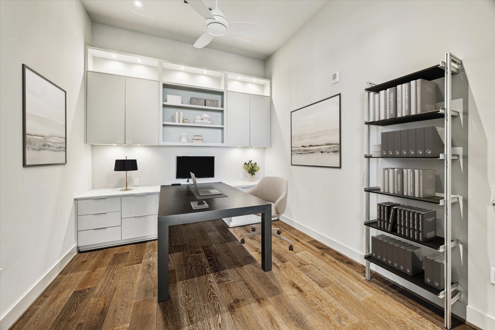 3331 D'Amico Street, Unit 1003 Houston, TX 77019 - Photo 16 of 46 a living room with stainless steel appliances furniture a rug and a book shelf