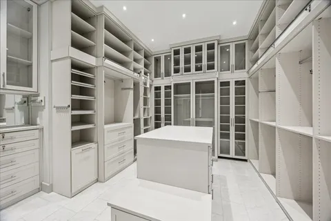 a view of living room with furniture and windows