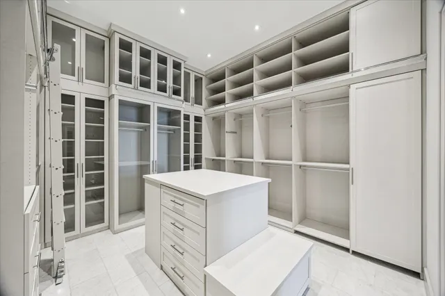 a kitchen with a cabinets and a stove top oven