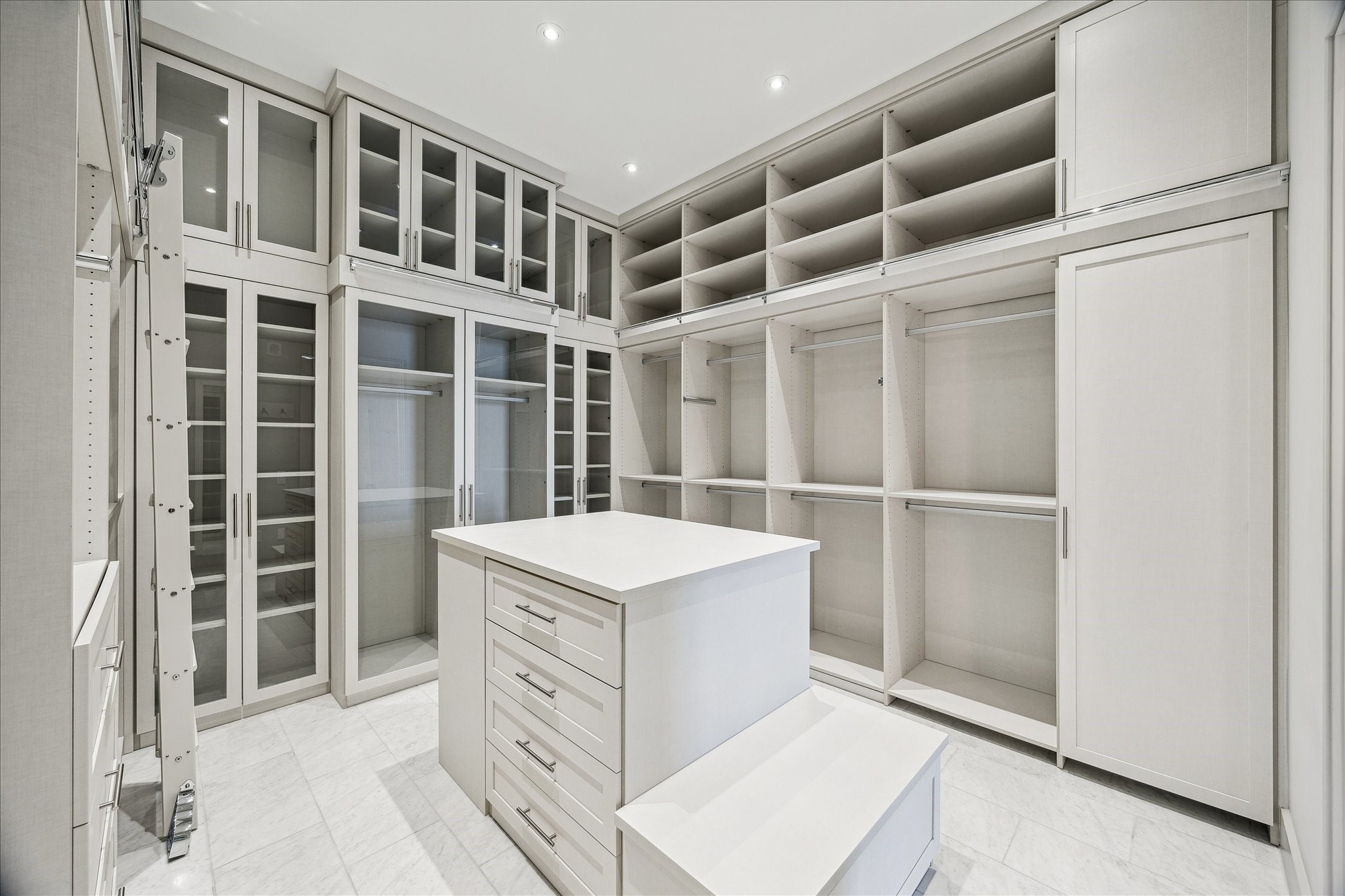 3331 D'Amico Street, Unit 1003 Houston, TX 77019 - Photo 25 of 46 a kitchen with a cabinets and a stove top oven