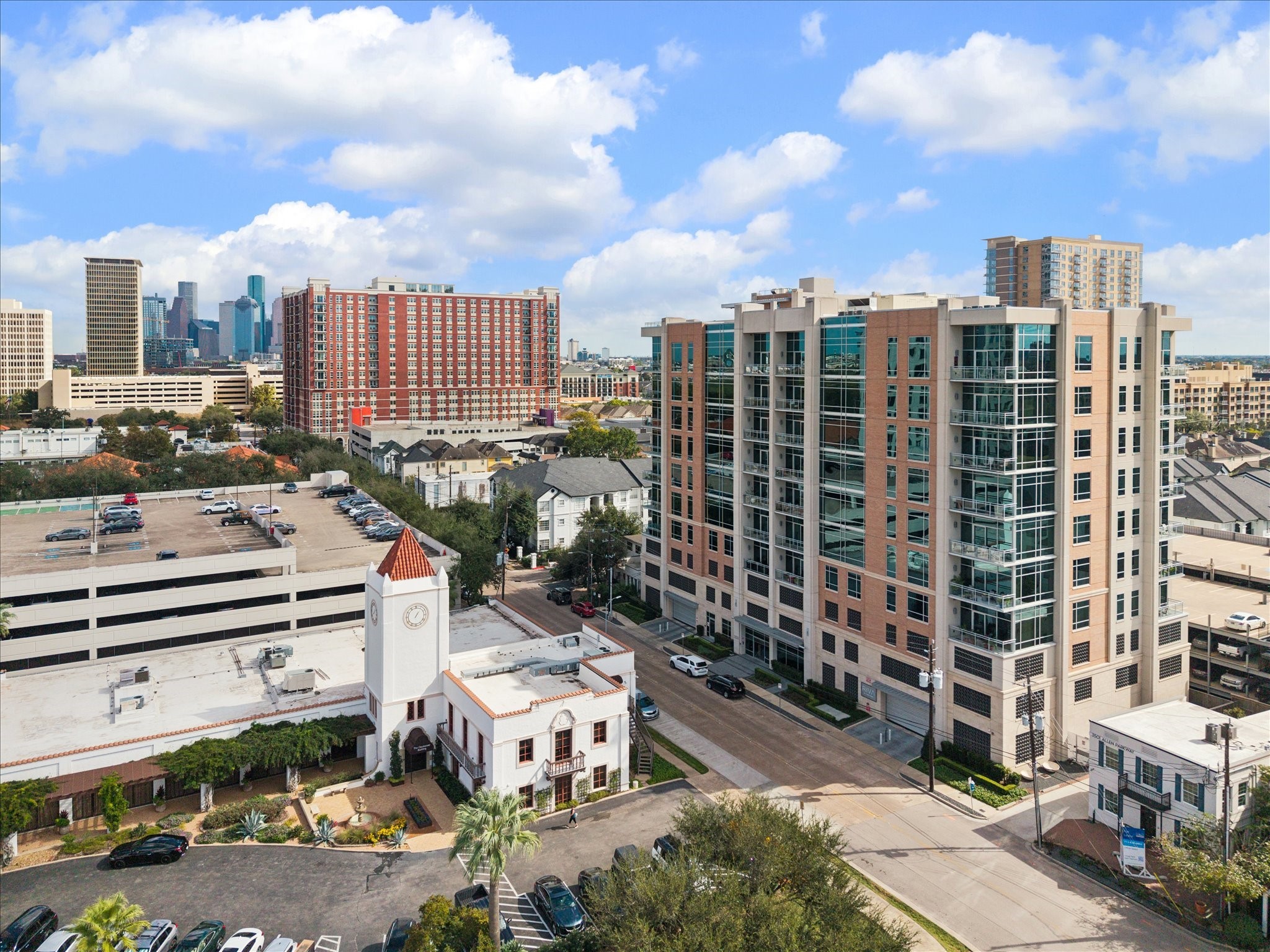 3331 D'Amico Street, Unit 1003 Houston, TX 77019 - Photo 34 of 46 a city view with tall buildings