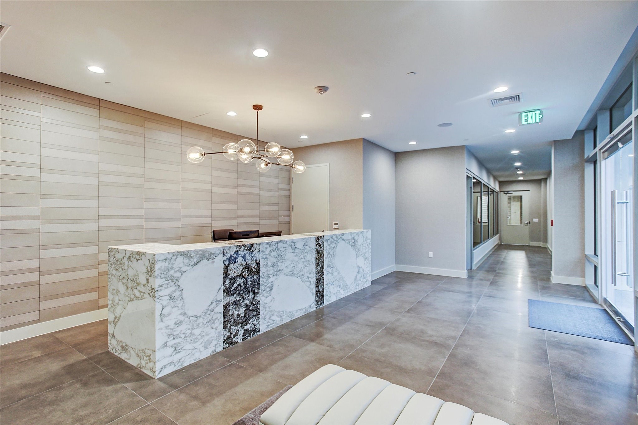 3331 D'Amico Street, Unit 1003 Houston, TX 77019 - Photo 37 of 46 a view of a hallway with seating area