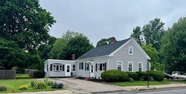61 Center Street Bridgewater, MA 02324 - Photo 1 of 33 a front view of a house with a yard