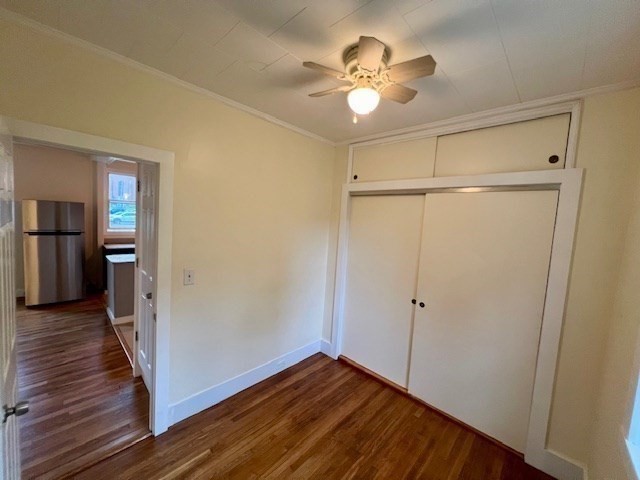 61 Center Street Bridgewater, MA 02324 - Photo 15 of 33 wooden floor in an empty room with a window