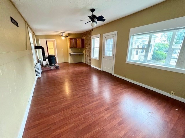 61 Center Street Bridgewater, MA 02324 - Photo 17 of 33 a view of empty room with wooden floor and fan