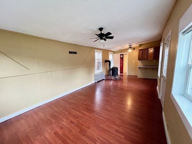 61 Center Street Bridgewater, MA 02324 - Photo 18 of 33 a view of empty room with wooden floor and fan