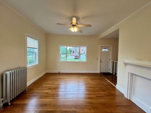 61 Center Street Bridgewater, MA 02324 - Photo 19 of 33 wooden floor in an empty room with a window