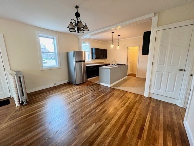 61 Center Street Bridgewater, MA 02324 - Photo 20 of 33 a view of a living room hardwood floor and a kitchen