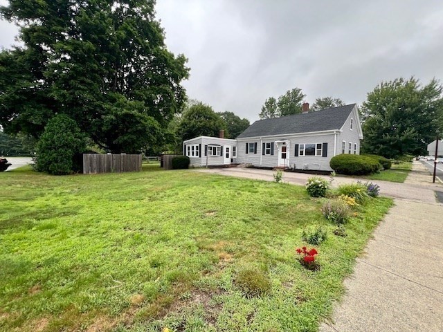 61 Center Street Bridgewater, MA 02324 - Photo 2 of 33 a view of a house with a yard and sitting area