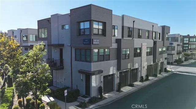 a city street lined with tall buildings