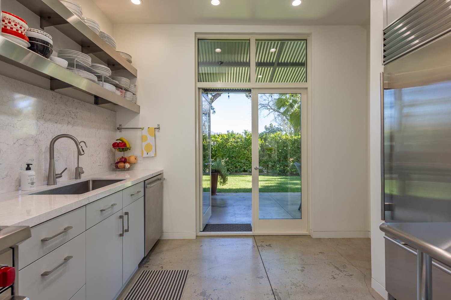 312 Fox Street Ojai, CA 93023 - Photo 18 of 43 a kitchen with a sink and large window