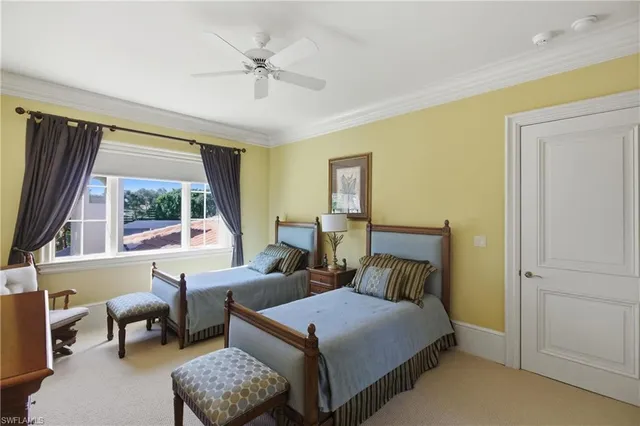 a bedroom with a bed and furniture