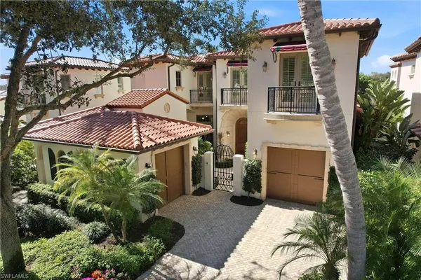 a view of a house with a garden