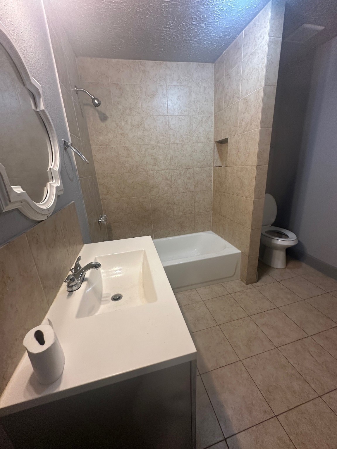 4502 Cavalcade Street Houston, TX 77026 - Photo 7 of 11 a bathroom with a sink a toilet and shower