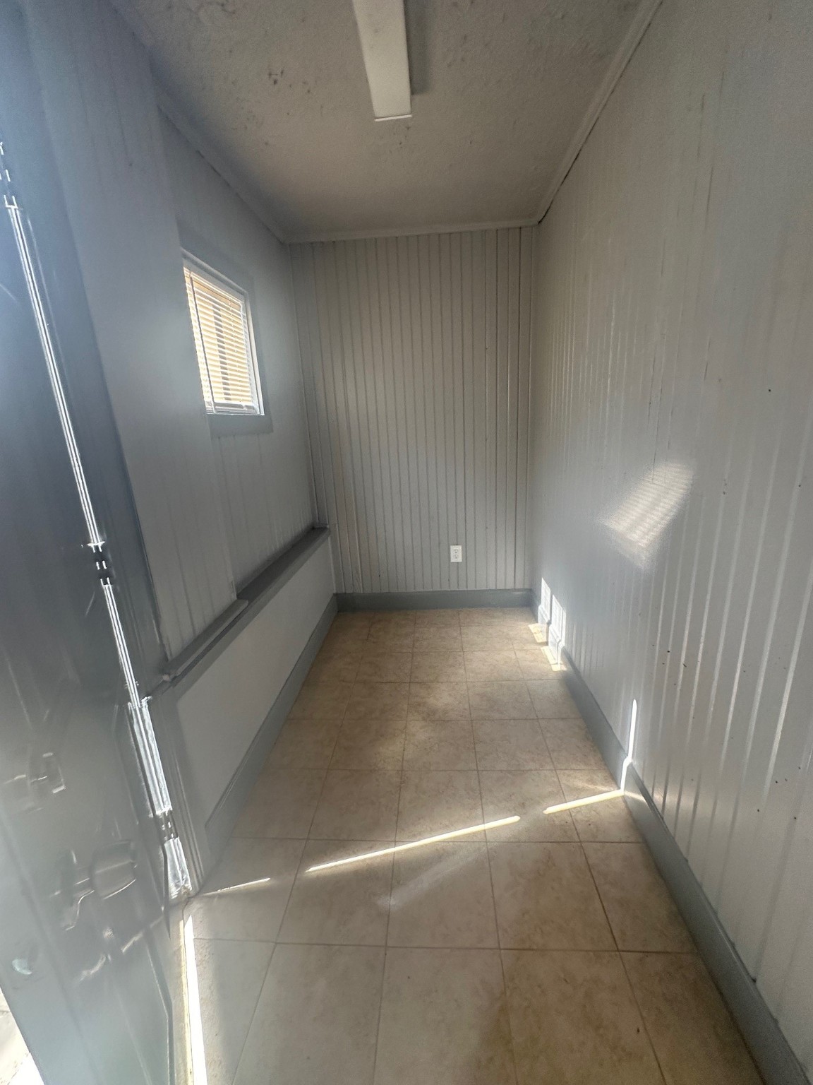 4502 Cavalcade Street Houston, TX 77026 - Photo 10 of 11 a view of an empty room with windows