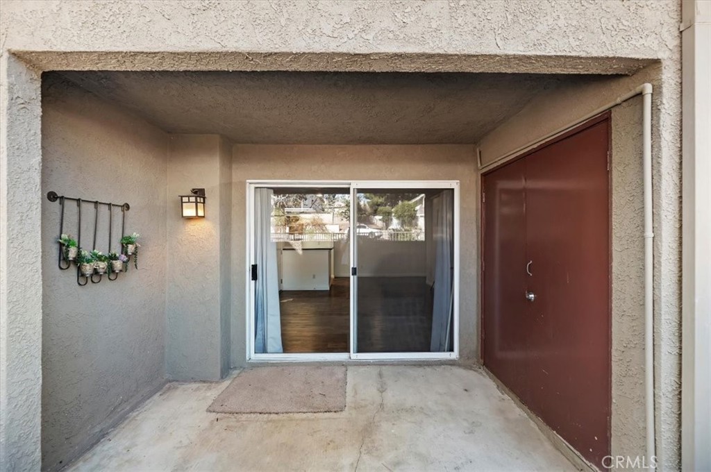 200 East Alessandro Boulevard, Unit 79 Riverside, CA 92508 - Photo 16 of 30 a view of a hallway with wooden shelves