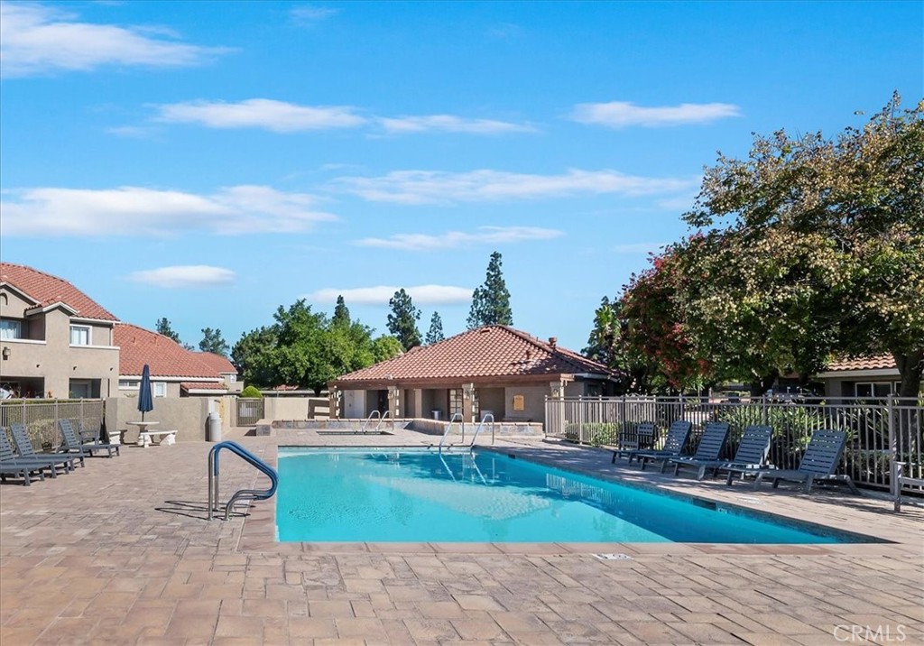 200 East Alessandro Boulevard, Unit 79 Riverside, CA 92508 - Photo 27 of 30 a front view of a house with a yard
