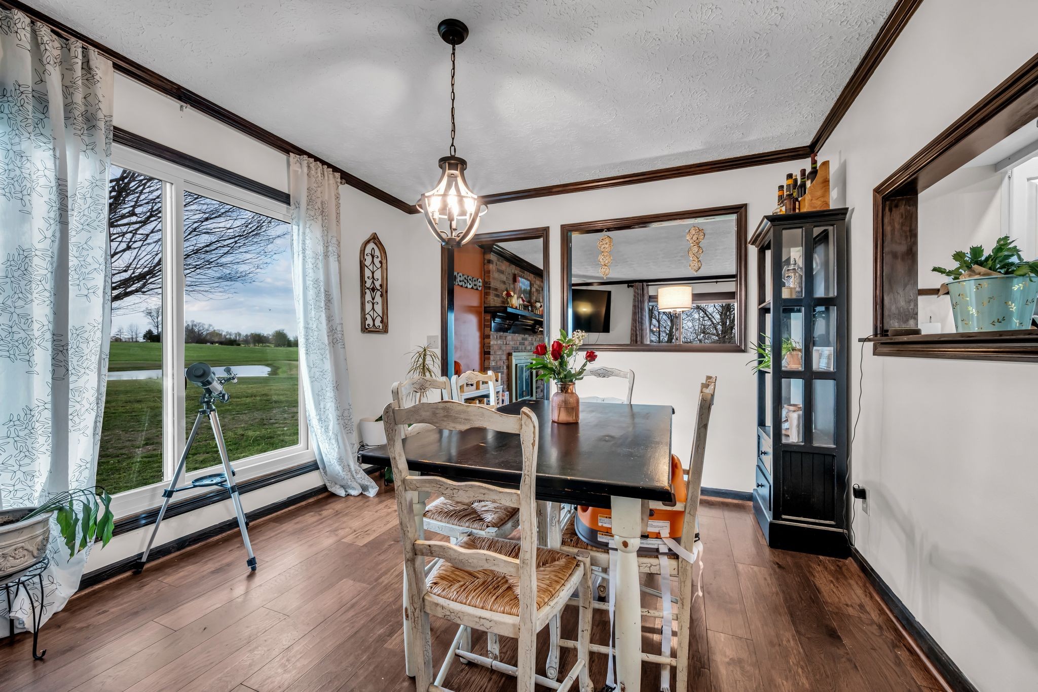 2280 C C C Road Dickson, TN 37055 - Photo 12 of 35 a view of a dining room with furniture window and wooden floor